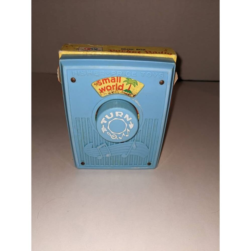 Vintage 1977 Fisher Price Music Box Pocket Radio ITS A SMALL WORLD #746 Works